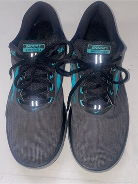 Brooks women’s 10 Black and Teal Running Walking Pure Flow Shoes